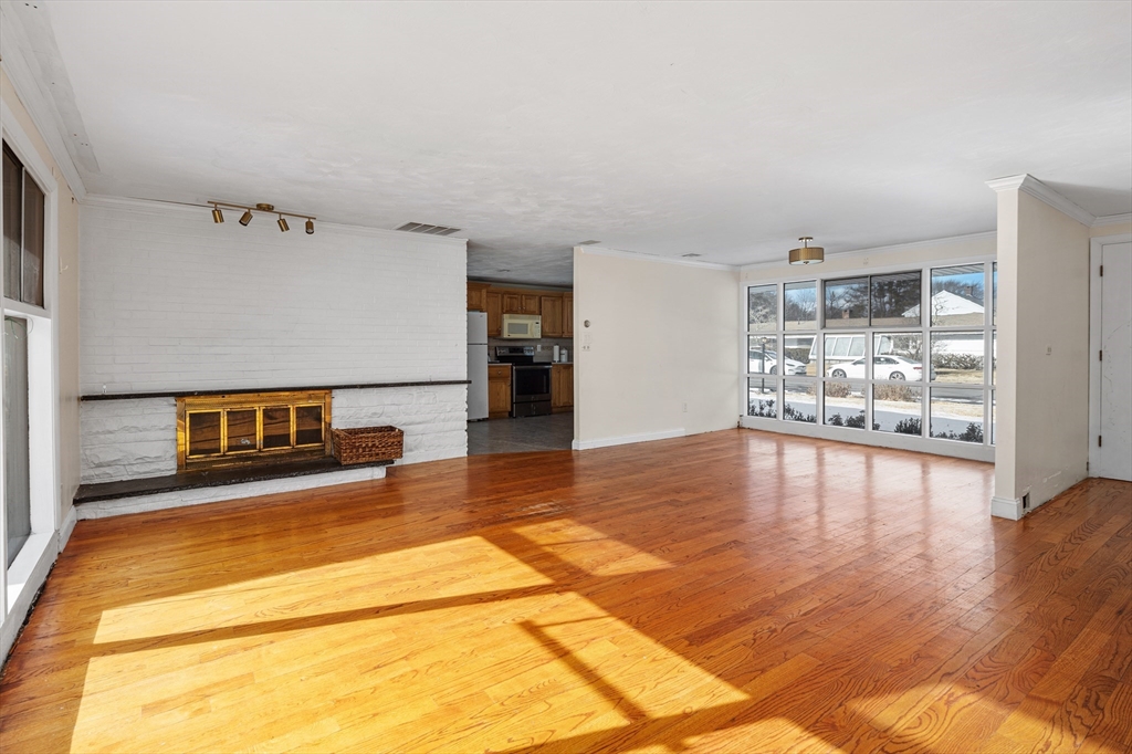 5 Richard Road Hingham, MA 02043 - Photo 3 of 12 a view of a living room with kitchen