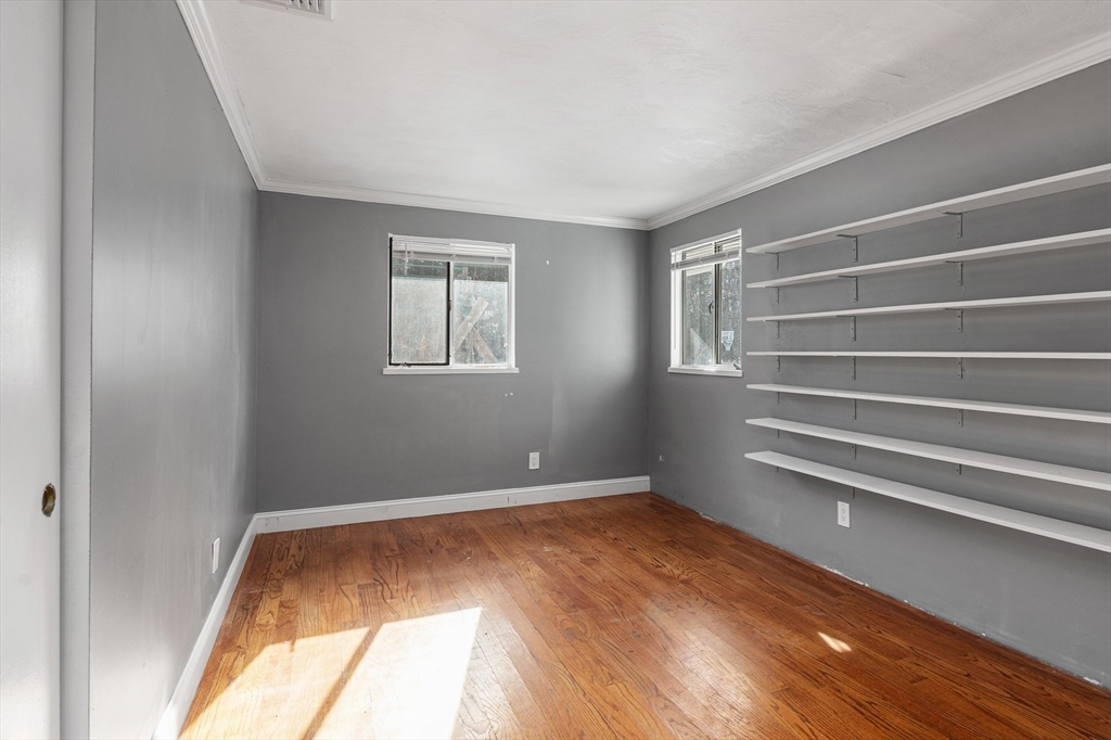5 Richard Road Hingham, MA 02043 - Photo 9 of 12 a view of room with window and hardwood floor