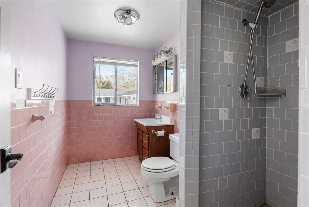 5 Richard Road Hingham, MA 02043 - Photo 10 of 12 a bathroom with a sink a toilet and shower