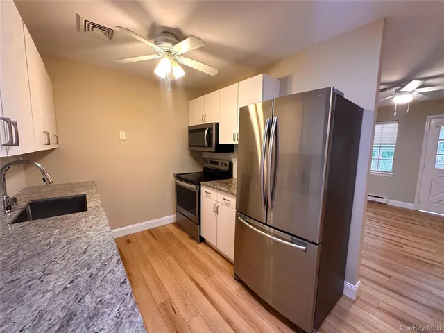 $2,150 | 312 Woodbridge Drive, Unit C, Ridge, NY 11961