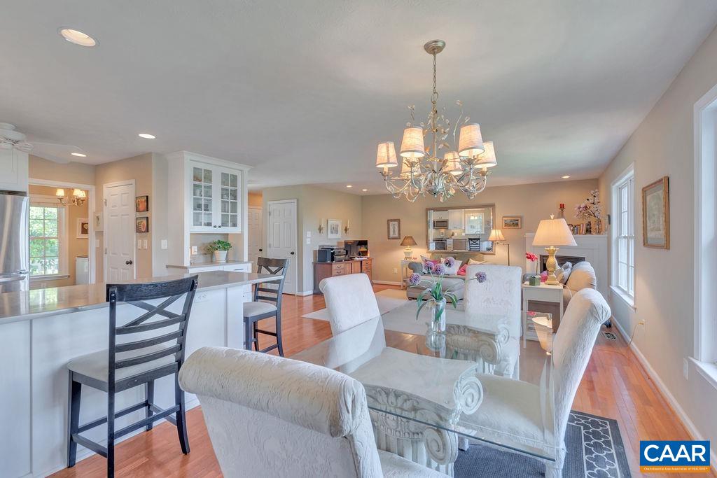 205 Old Stony Ridge Road Afton, VA 22920 - Photo 20 of 70 a view of a dining room with furniture a chandelier and wooden floor