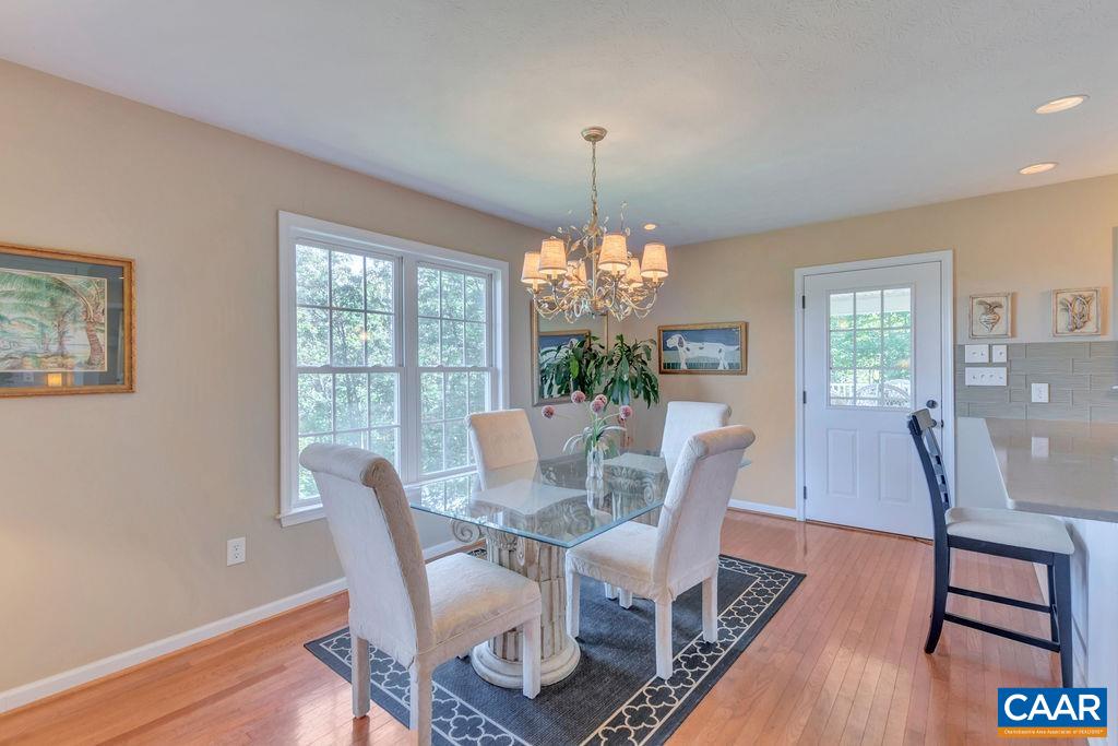 205 Old Stony Ridge Road Afton, VA 22920 - Photo 22 of 70 a view of a dining room with furniture window and wooden floor