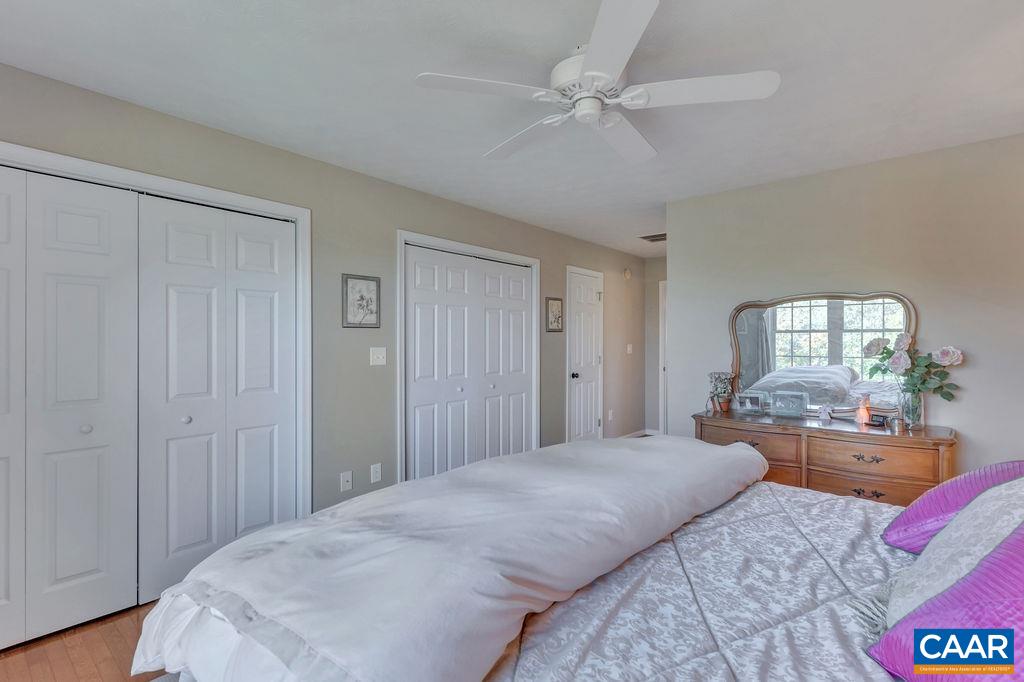 205 Old Stony Ridge Road Afton, VA 22920 - Photo 25 of 70 a bedroom with a bed and wooden floor