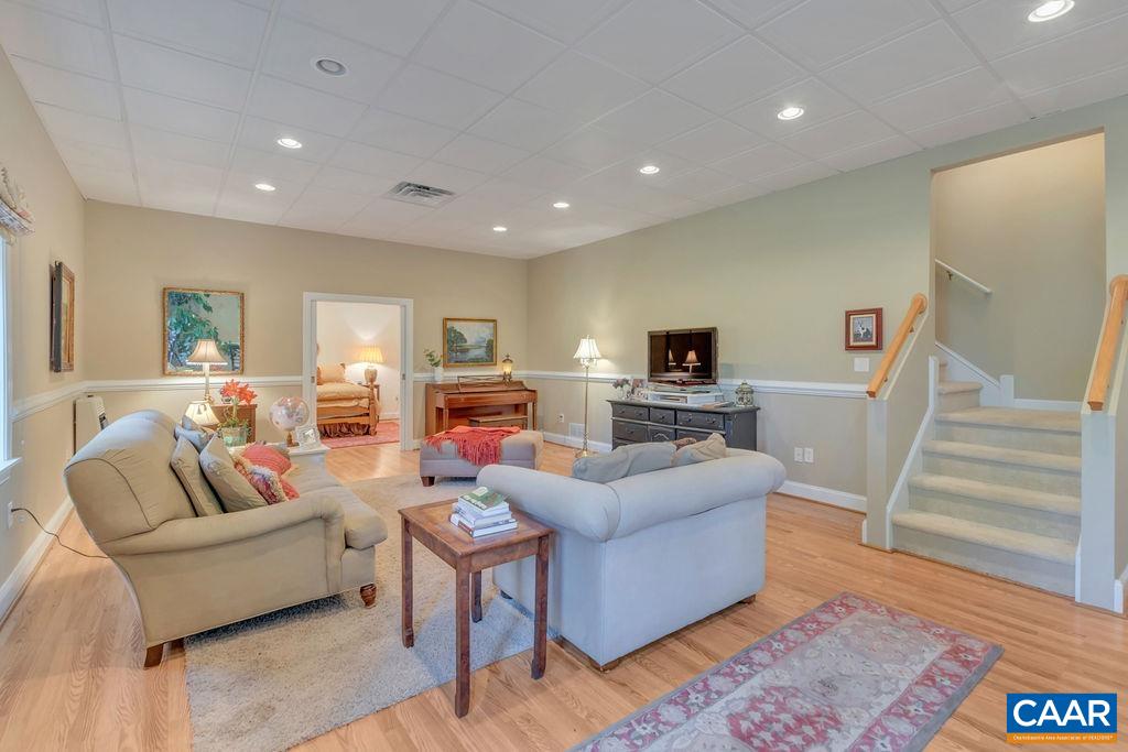 205 Old Stony Ridge Road Afton, VA 22920 - Photo 34 of 70 a living room with furniture and a wooden floor