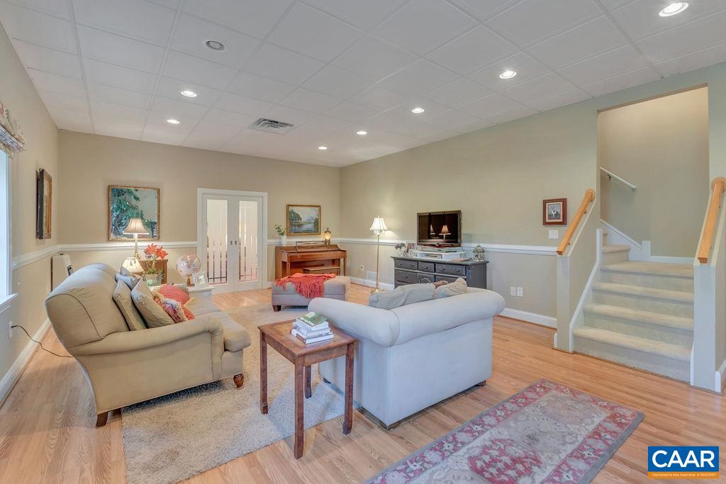 205 Old Stony Ridge Road Afton, VA 22920 - Photo 35 of 70 a living room with furniture and a wooden floor