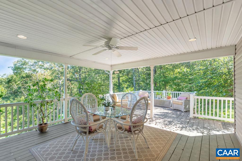 205 Old Stony Ridge Road Afton, VA 22920 - Photo 47 of 70 a view of a patio with a table chairs and backyard