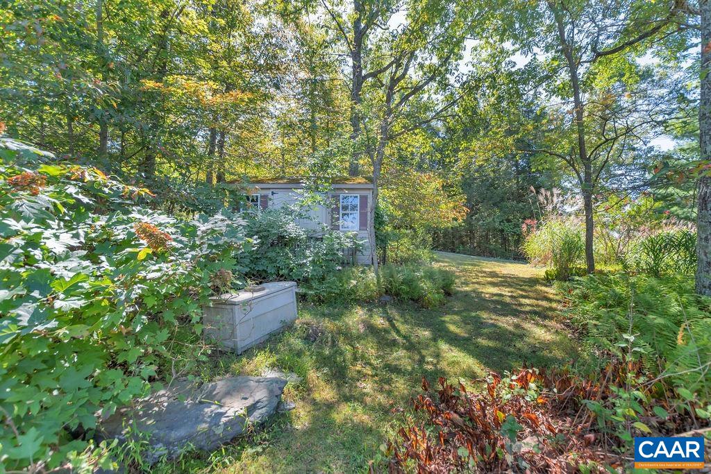 205 Old Stony Ridge Road Afton, VA 22920 - Photo 58 of 70 a backyard of a house with outdoor seating and green space