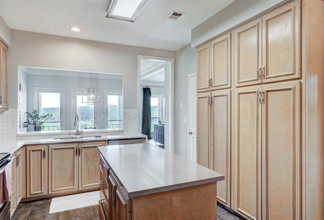 16 Tournament Way The Hills, TX 78738 - Photo 13 of 40 a view of a kitchen from the hallway