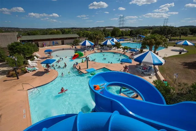 a view of a golf course with a lake