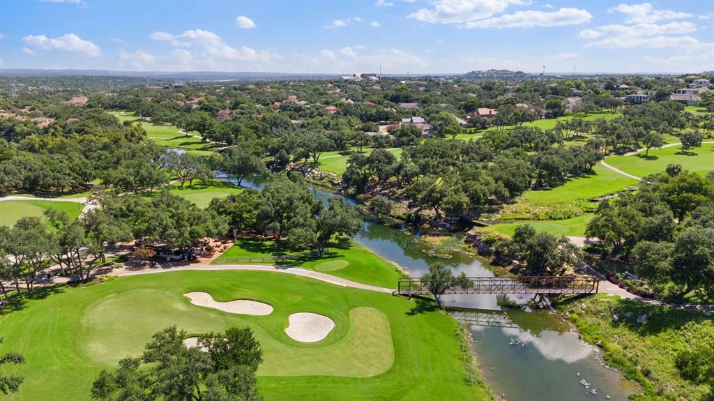 16 Tournament Way The Hills, TX 78738 - Photo 27 of 40 a view of a golf course with a lake