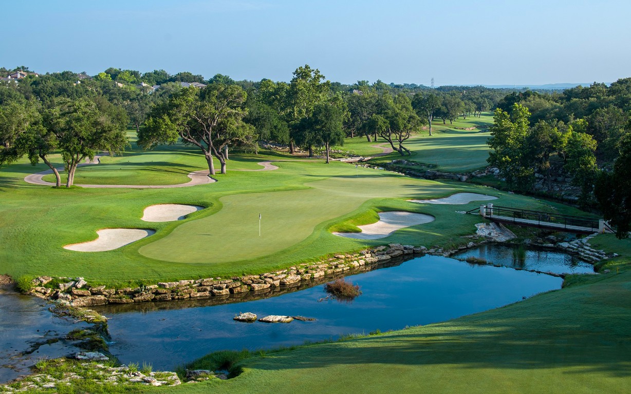 16 Tournament Way The Hills, TX 78738 - Photo 29 of 40 a view of a golf course with a garden
