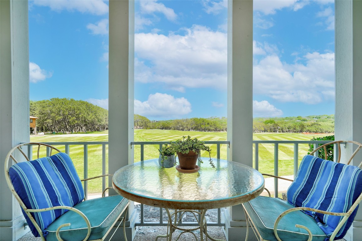 16 Tournament Way The Hills, TX 78738 - Photo 4 of 40 a view of a dining room with furniture window and outside view
