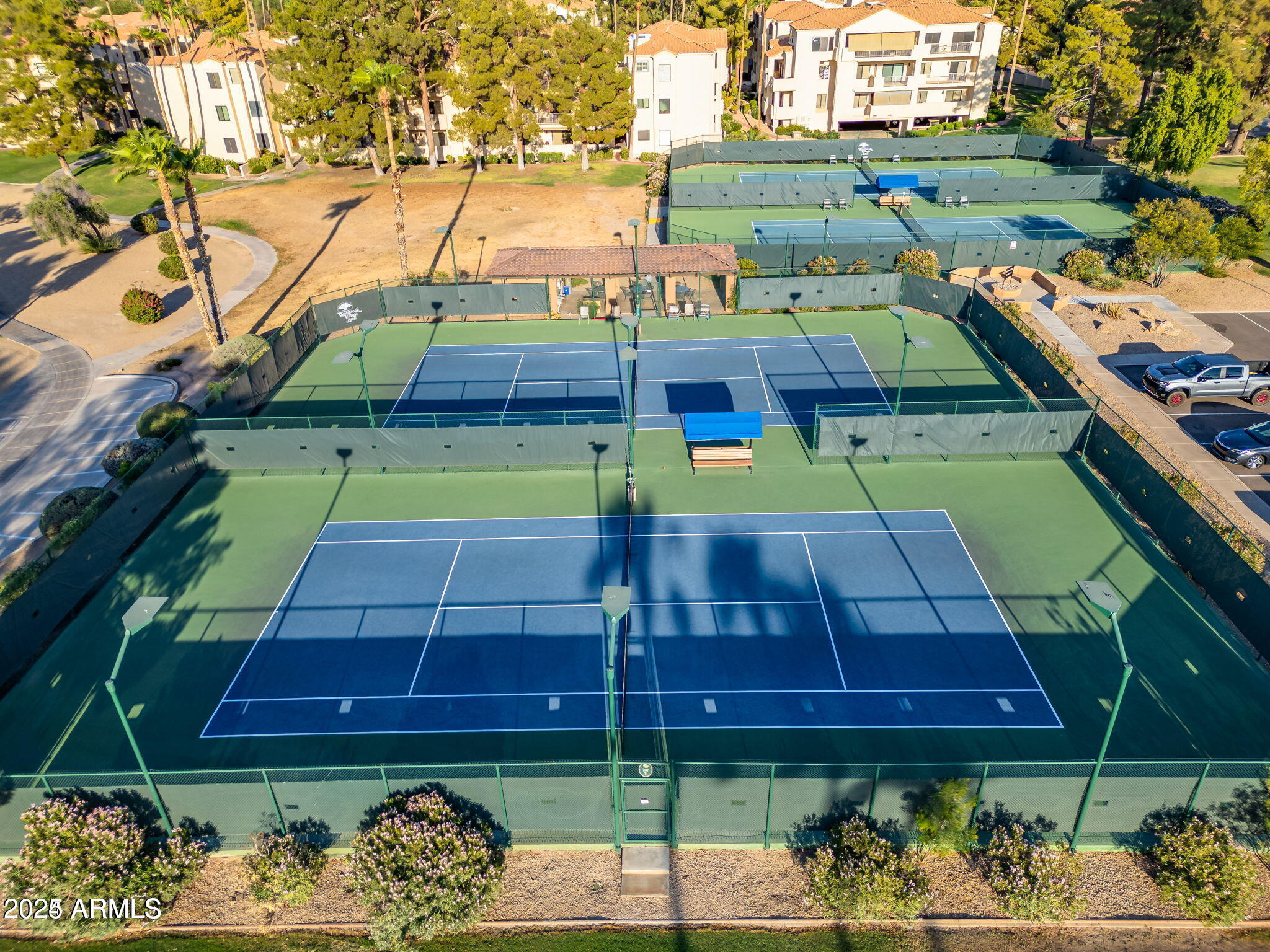19095 North 97th Lane Peoria, AZ 85382 - Photo 23 of 36 a view of a backyard with plants and a patio
