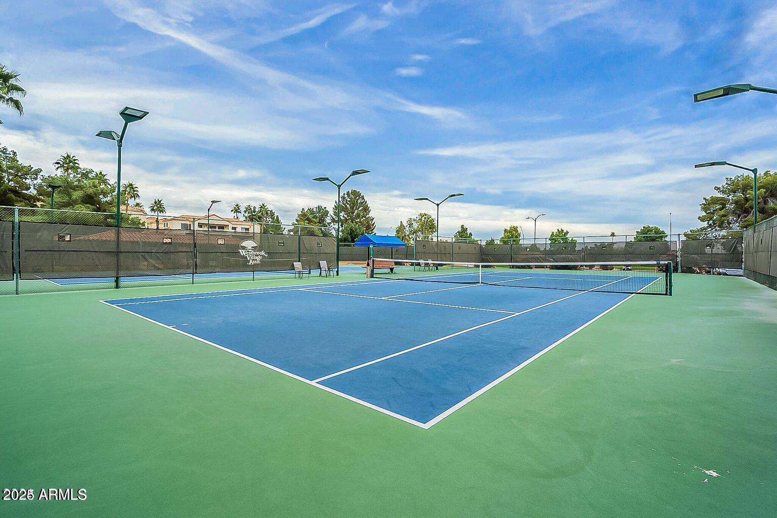 19095 North 97th Lane Peoria, AZ 85382 - Photo 24 of 36 a view of a tennis court