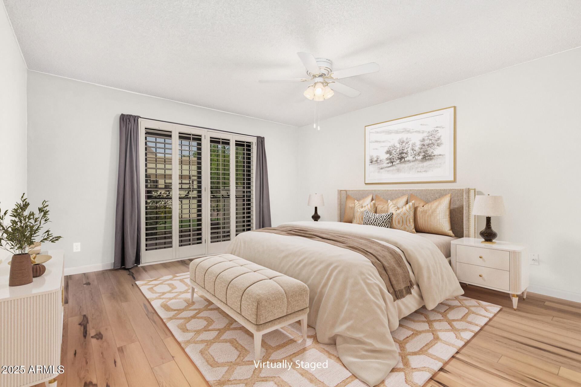 19095 North 97th Lane Peoria, AZ 85382 - Photo 5 of 36 a bedroom with a large bed and a window