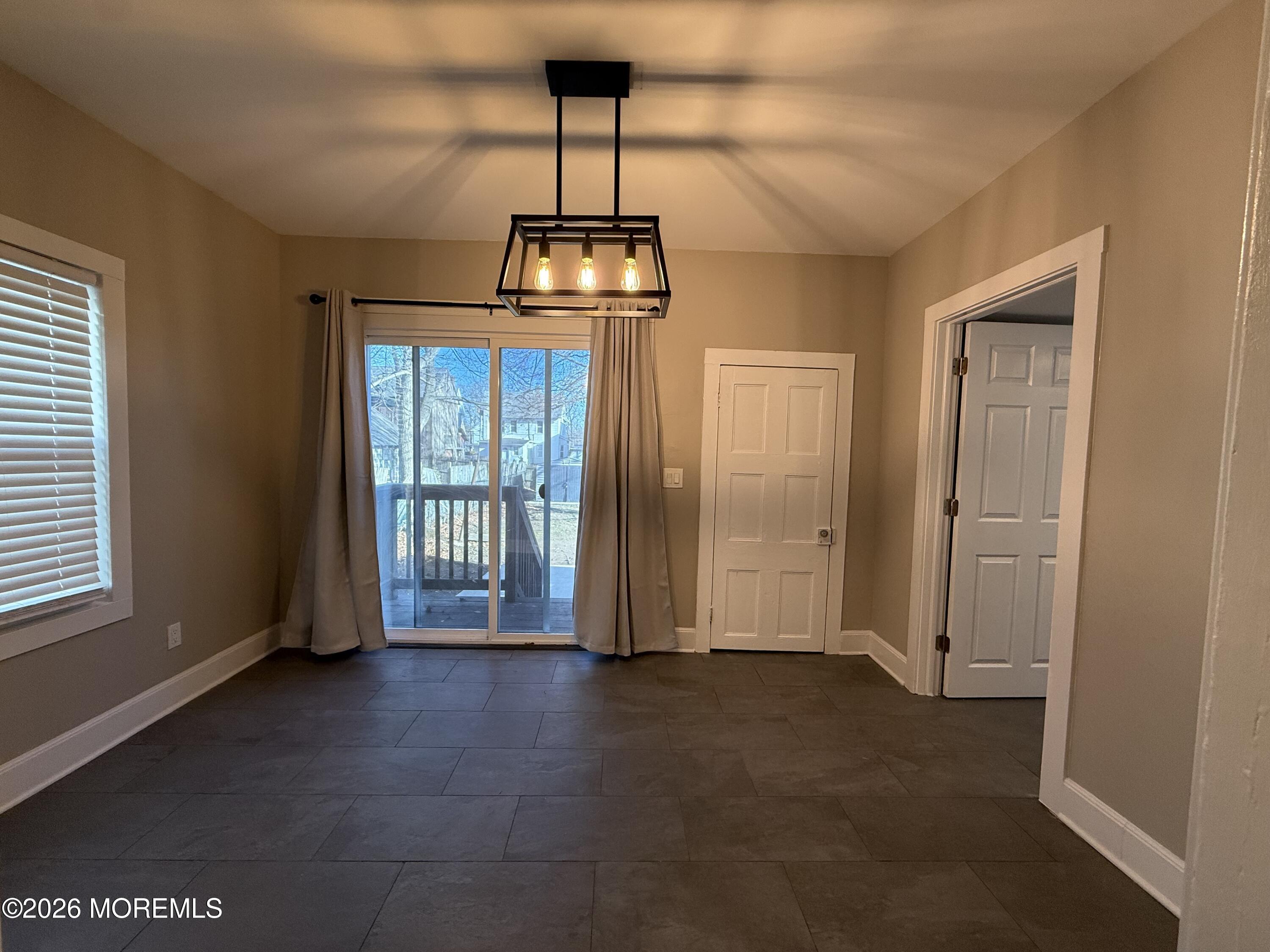 30 Conover Street Freehold, NJ 07728 - Photo 12 of 38 a view of empty room with wooden floor