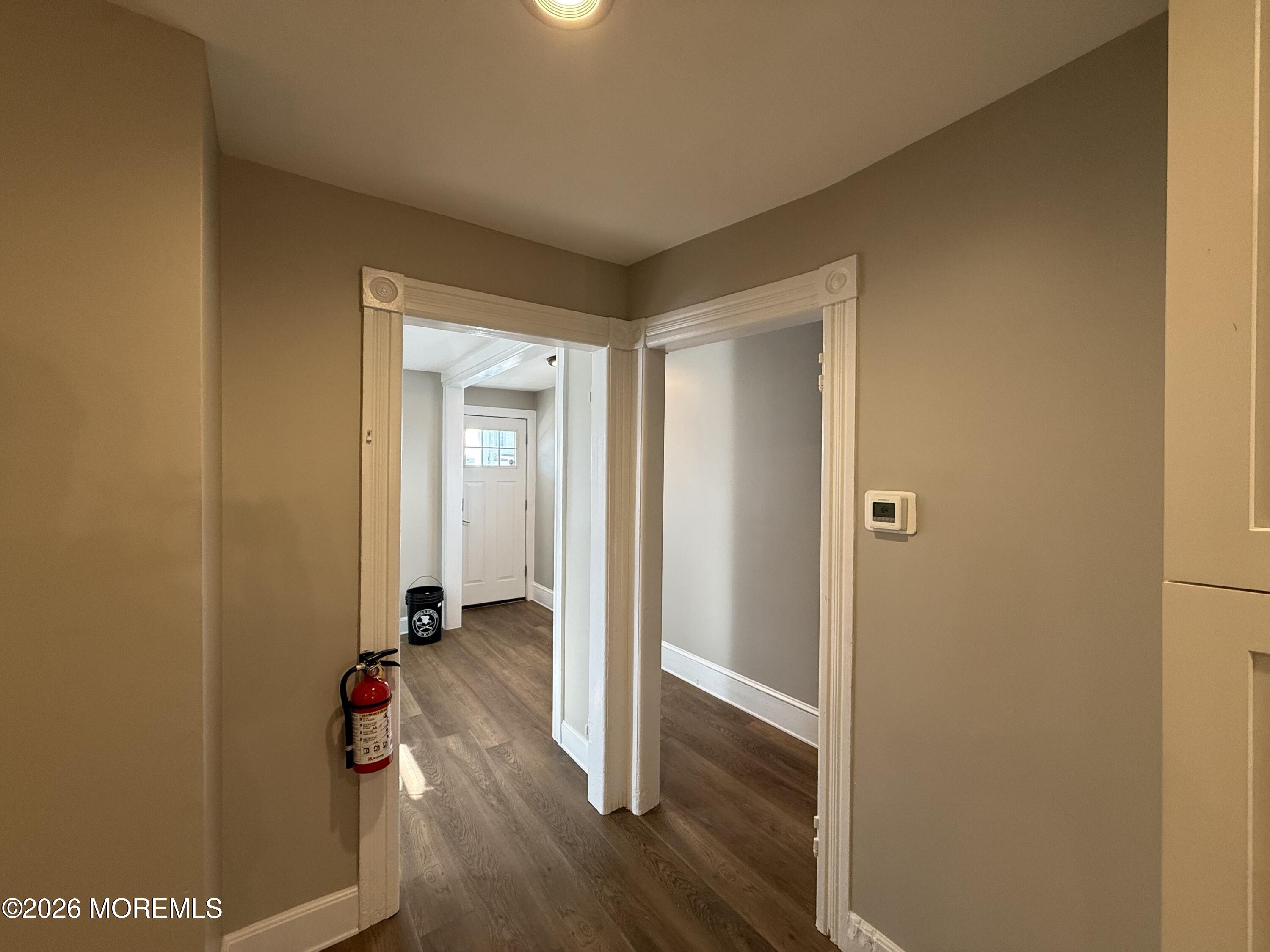 30 Conover Street Freehold, NJ 07728 - Photo 19 of 38 a view of a hallway with wooden floor