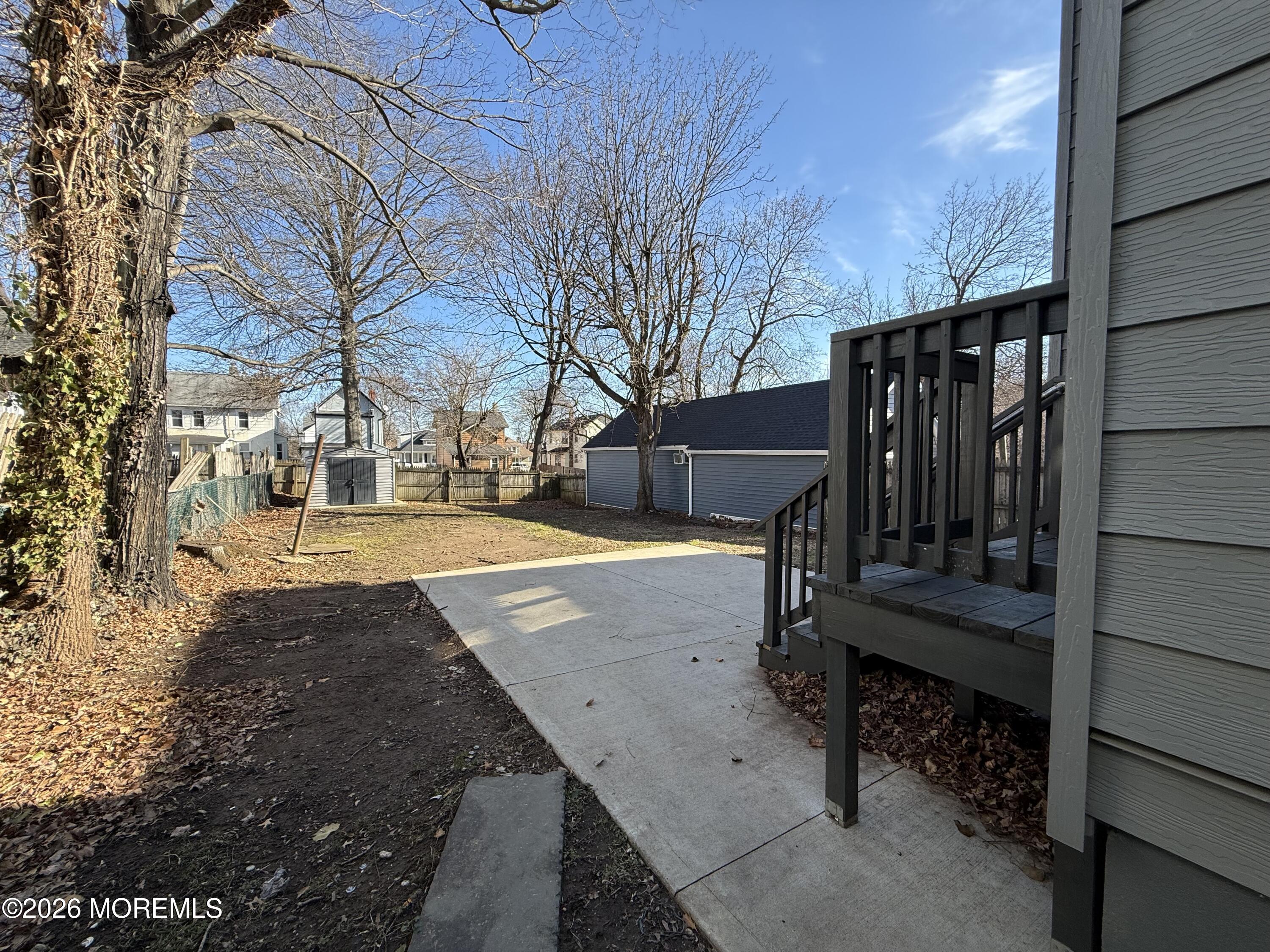 30 Conover Street Freehold, NJ 07728 - Photo 34 of 38 a view of yard with wooden fence