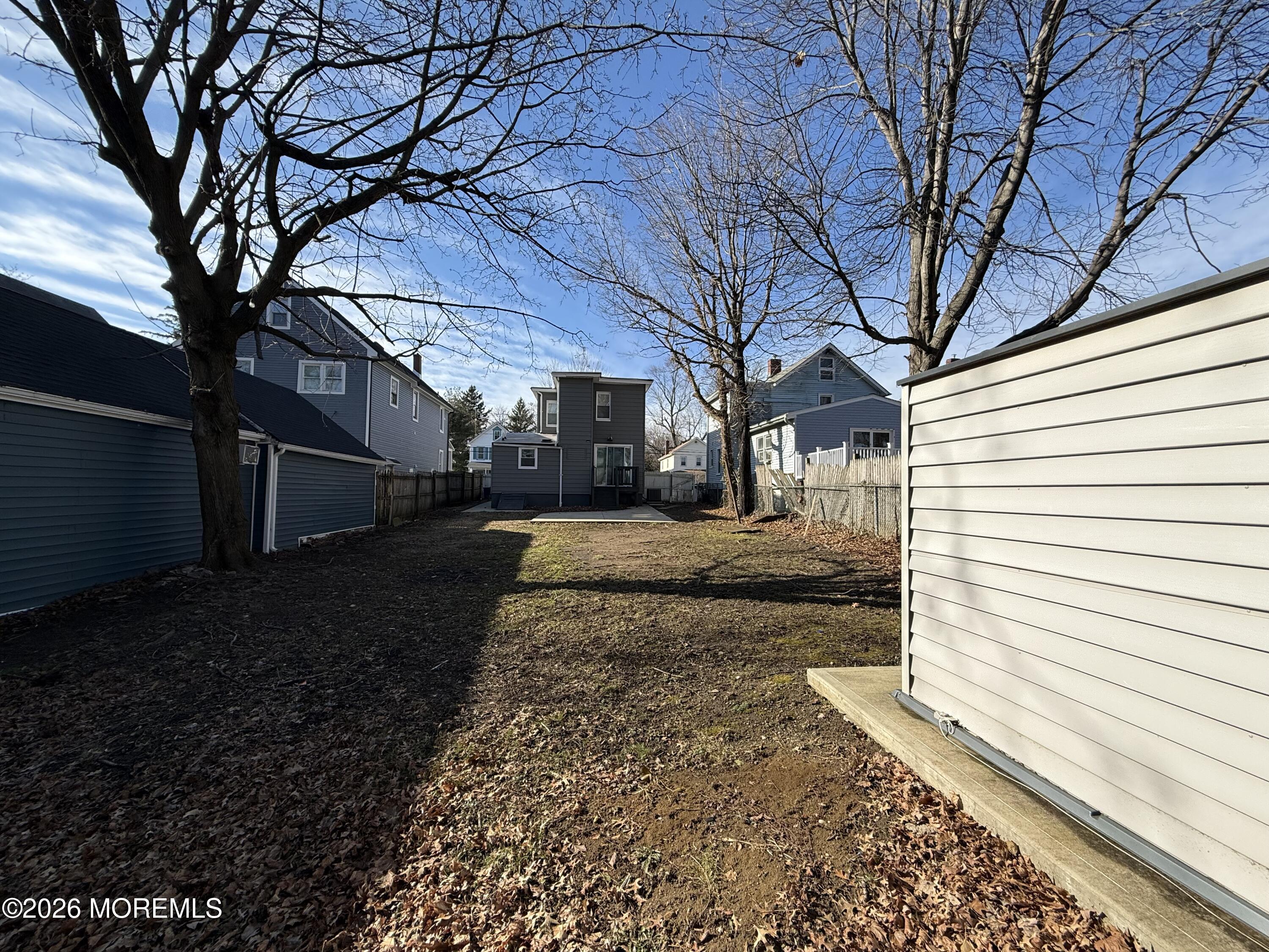 30 Conover Street Freehold, NJ 07728 - Photo 36 of 38 a view of a yard with a house