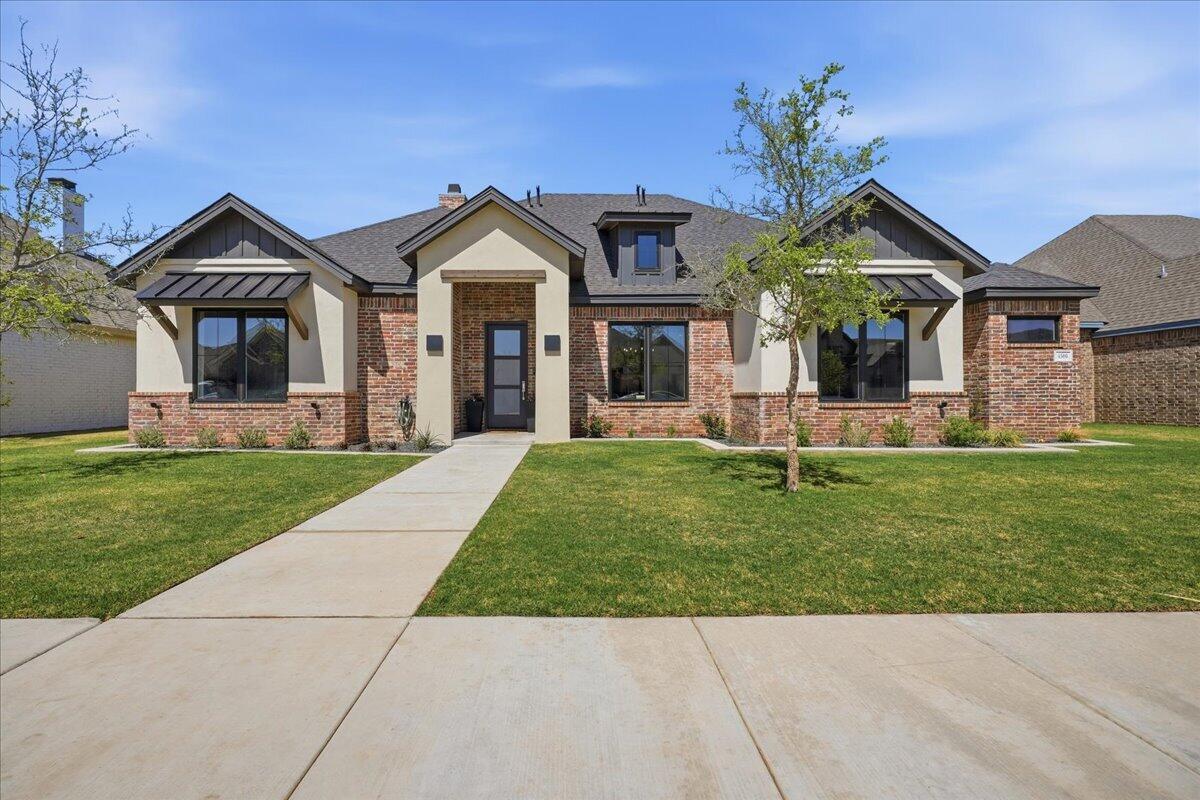 4506 140th Street Lubbock, TX 79424 - Photo 11 of 62 a front view of house with yard and green space