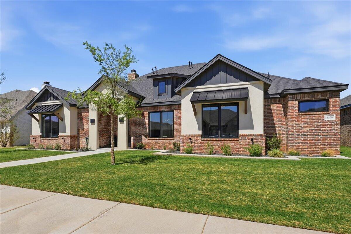 4506 140th Street Lubbock, TX 79424 - Photo 13 of 62 a front view of a house with a yard and trees