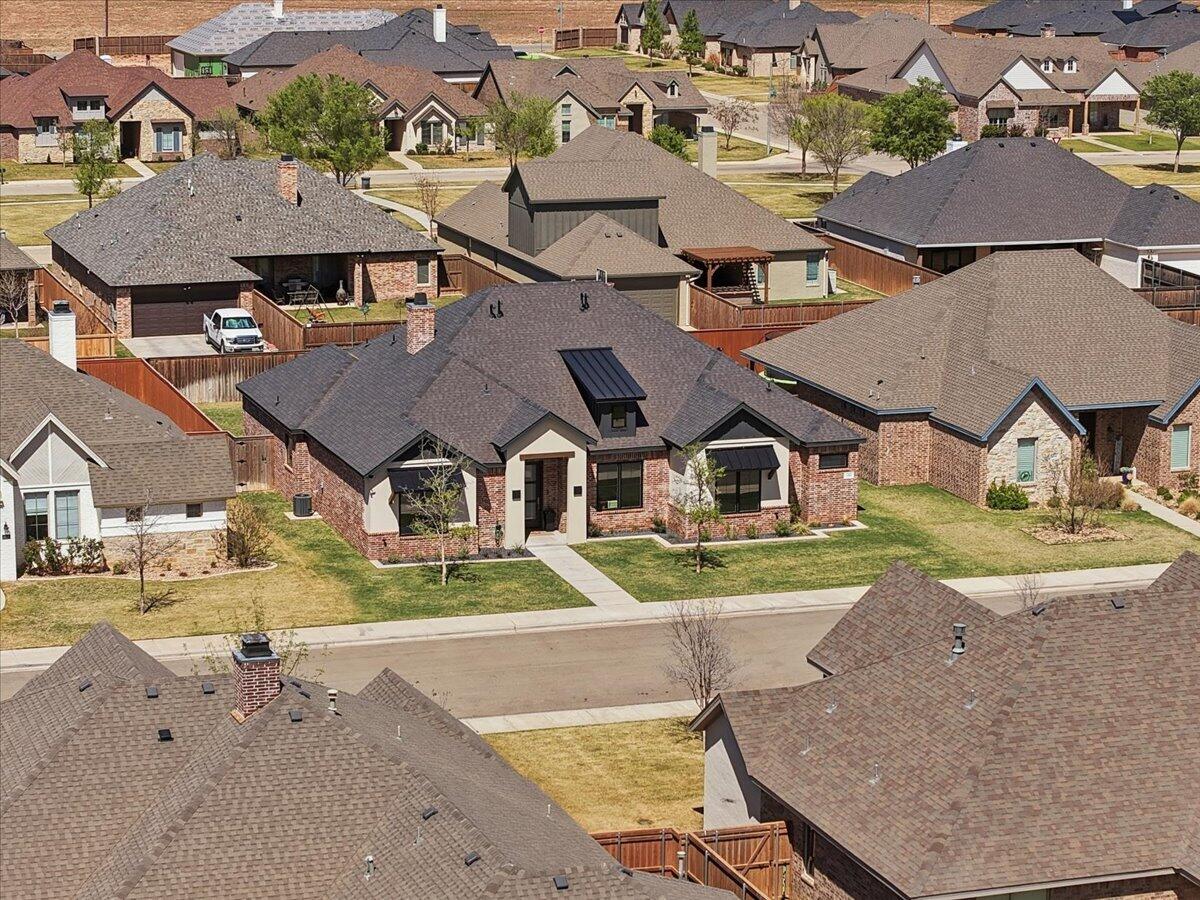 4506 140th Street Lubbock, TX 79424 - Photo 58 of 62 an aerial view of a house