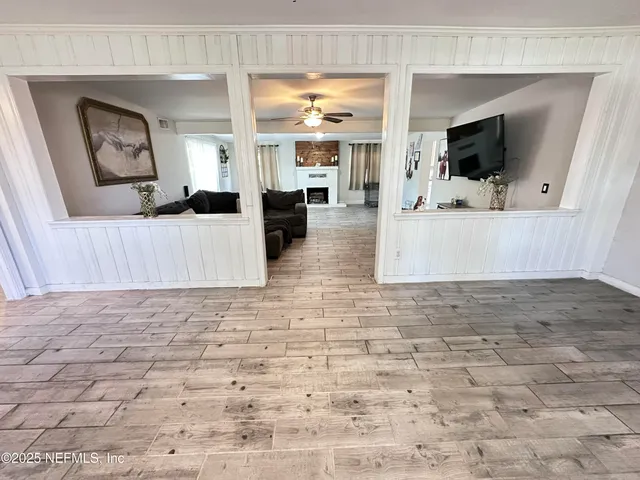 a view of living room with a flat screen tv