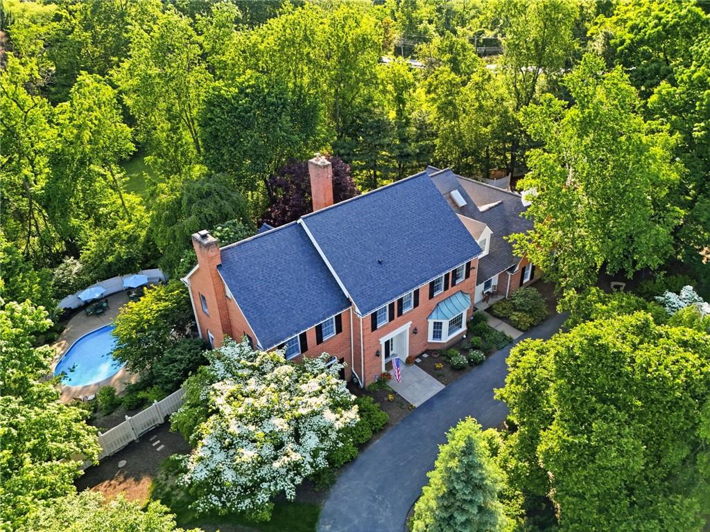 900 Settlers Ridge Road Pittsburgh, PA 15238 - Photo 49 of 50 An aerial perspective highlights the home's impressive scale, resort-style amenities, and beautifully wooded setting.