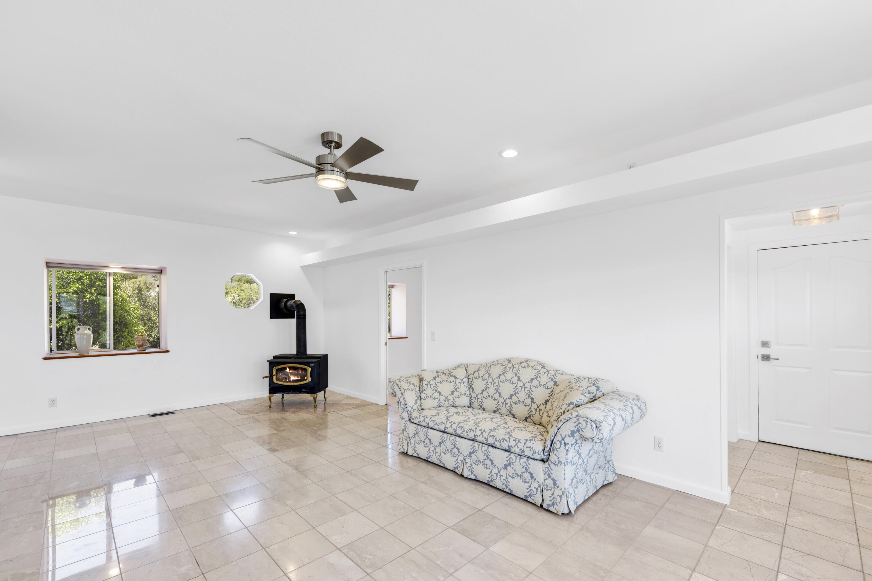 60425 Santa Rosa Road Mountain Center, CA 92561 - Photo 20 of 67 a living room with furniture and a window