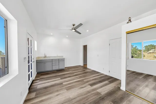 a view of a houses with a green yard