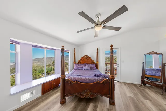 a workspace with furniture and window