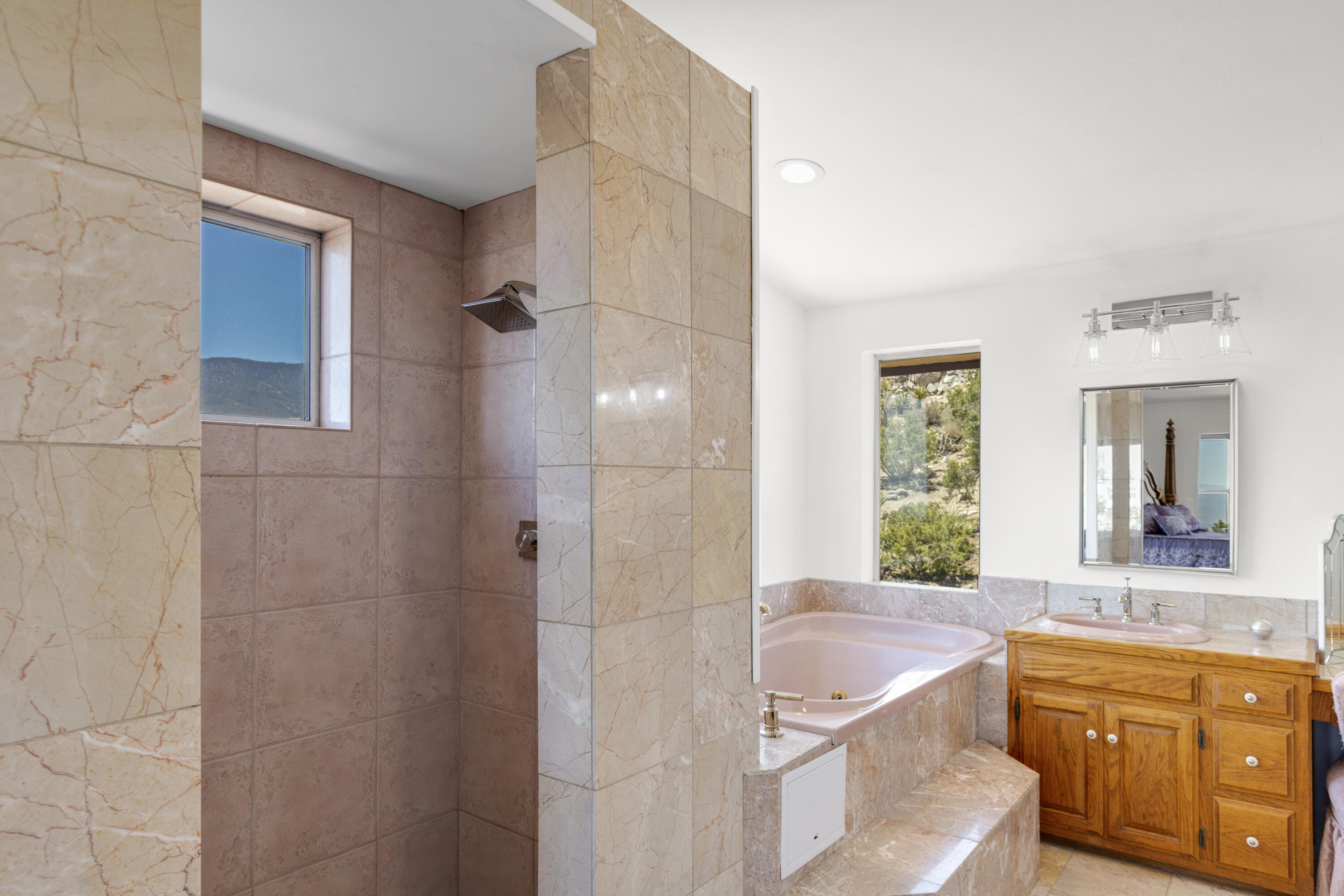 60425 Santa Rosa Road Mountain Center, CA 92561 - Photo 41 of 67 a bathroom with a granite countertop sink a bathtub and window