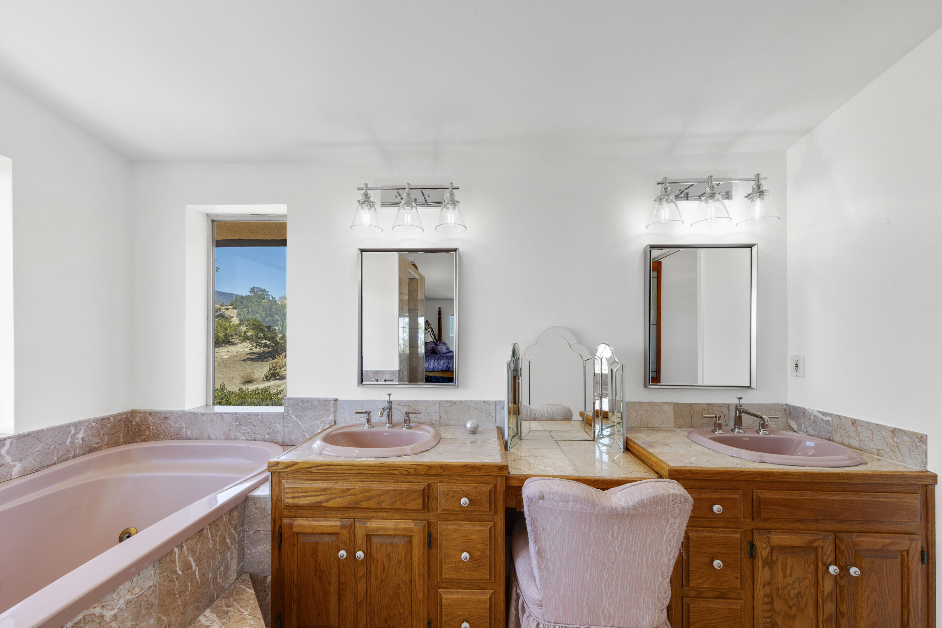 60425 Santa Rosa Road Mountain Center, CA 92561 - Photo 42 of 67 a bathroom with a granite countertop sink and a mirror