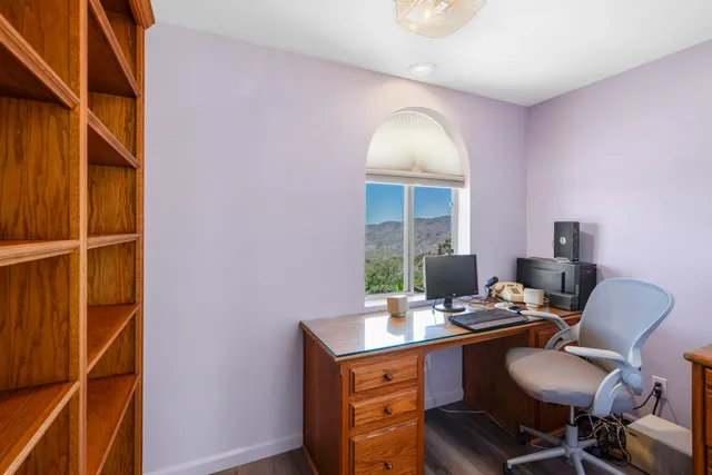 a view of a lake with a house