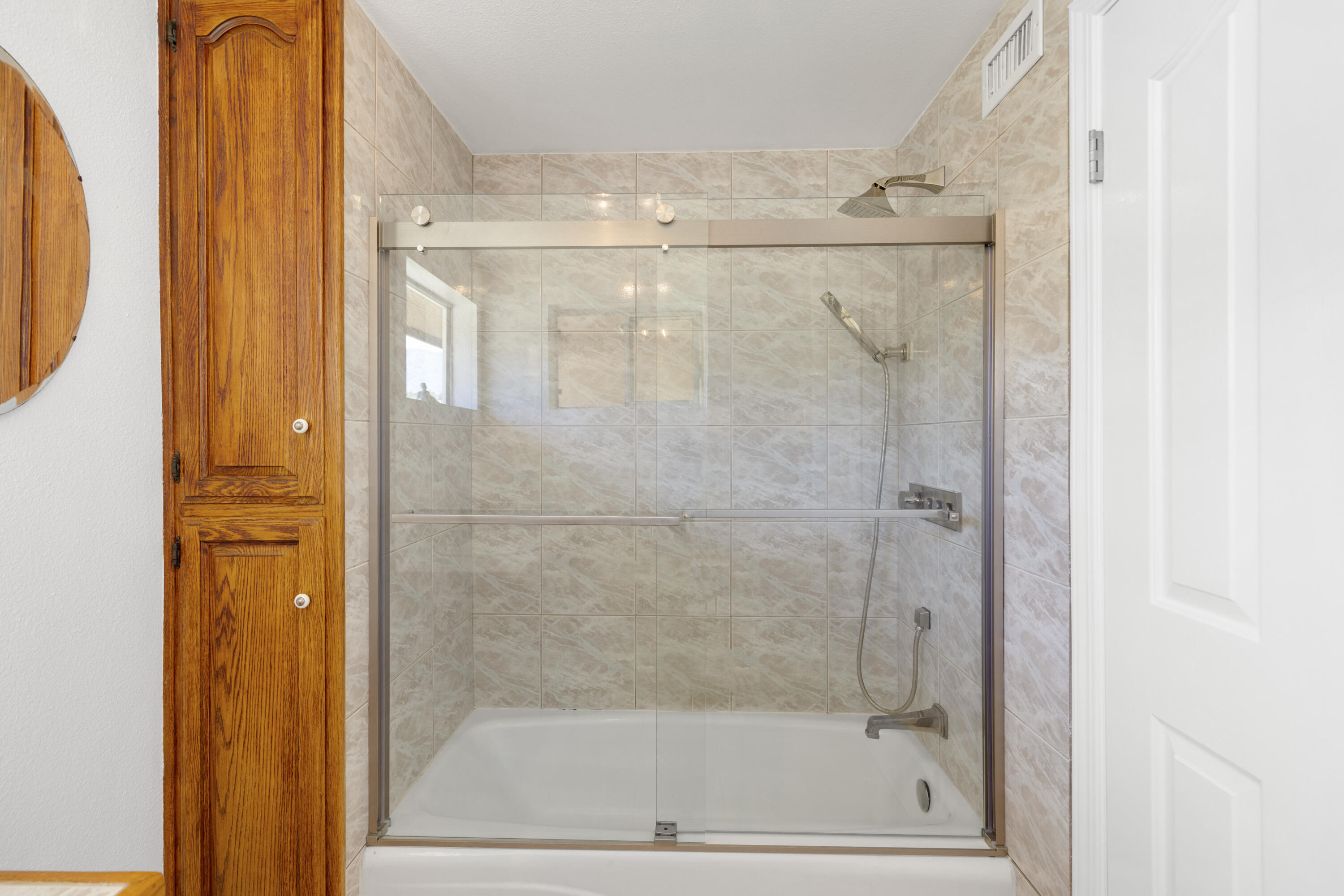 60425 Santa Rosa Road Mountain Center, CA 92561 - Photo 49 of 67 a bathroom with a glass shower door