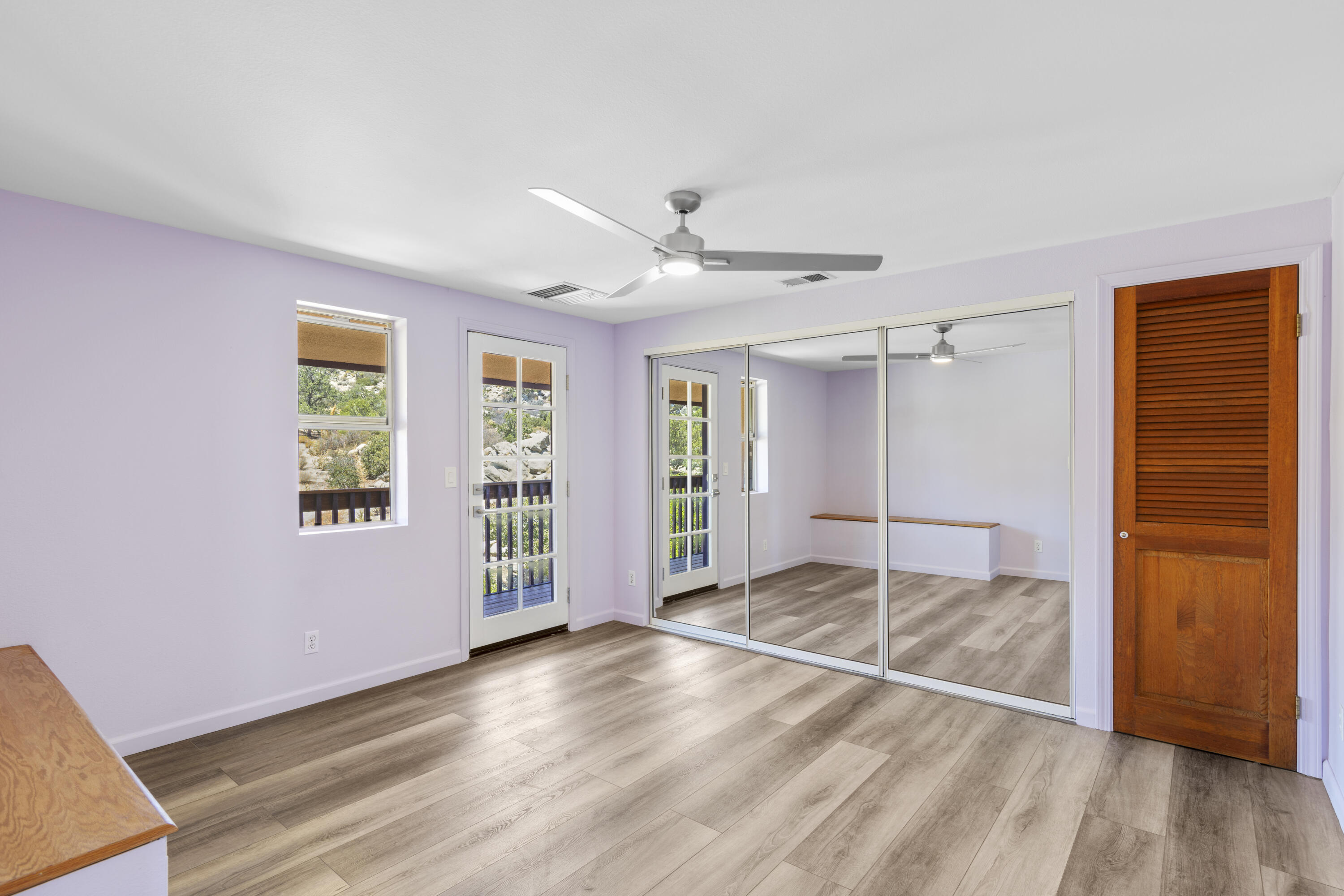 60425 Santa Rosa Road Mountain Center, CA 92561 - Photo 50 of 67 a view of livingroom with hardwood floor and a ceiling fan