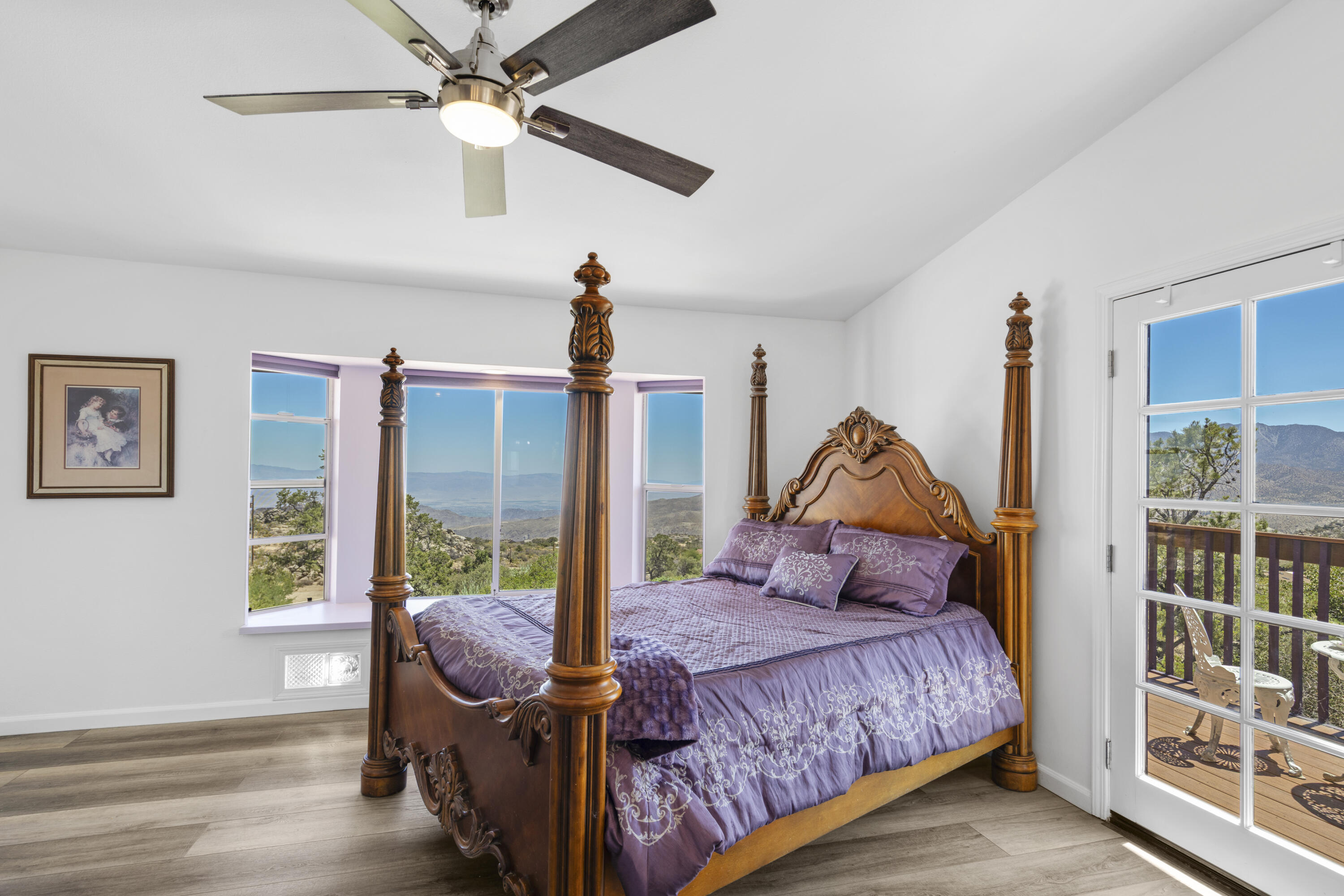 60425 Santa Rosa Road Mountain Center, CA 92561 - Photo 5 of 67 a bedroom with a bed and wooden floor