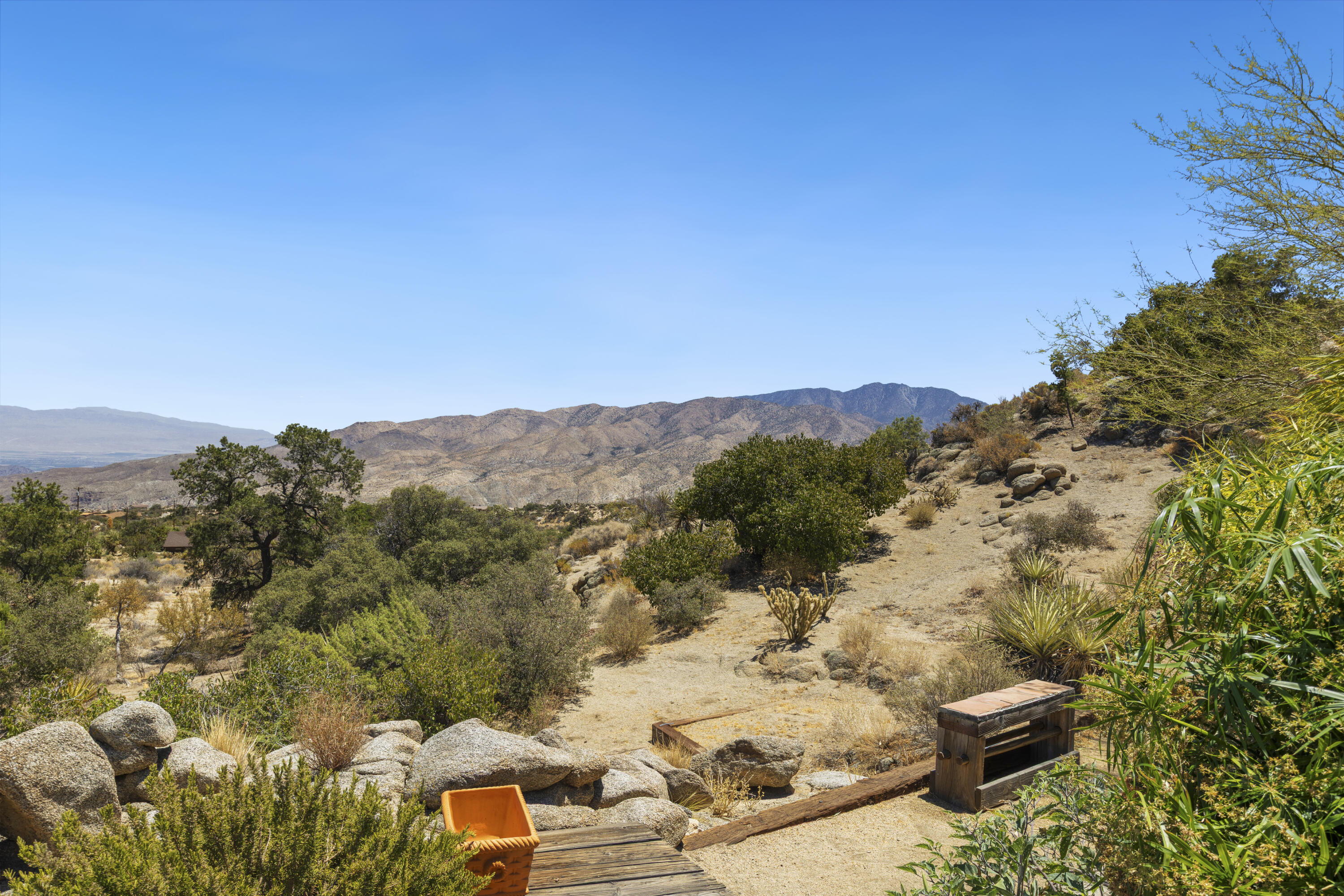60425 Santa Rosa Road Mountain Center, CA 92561 - Photo 64 of 67 a view of a backyard of a house with a mountain