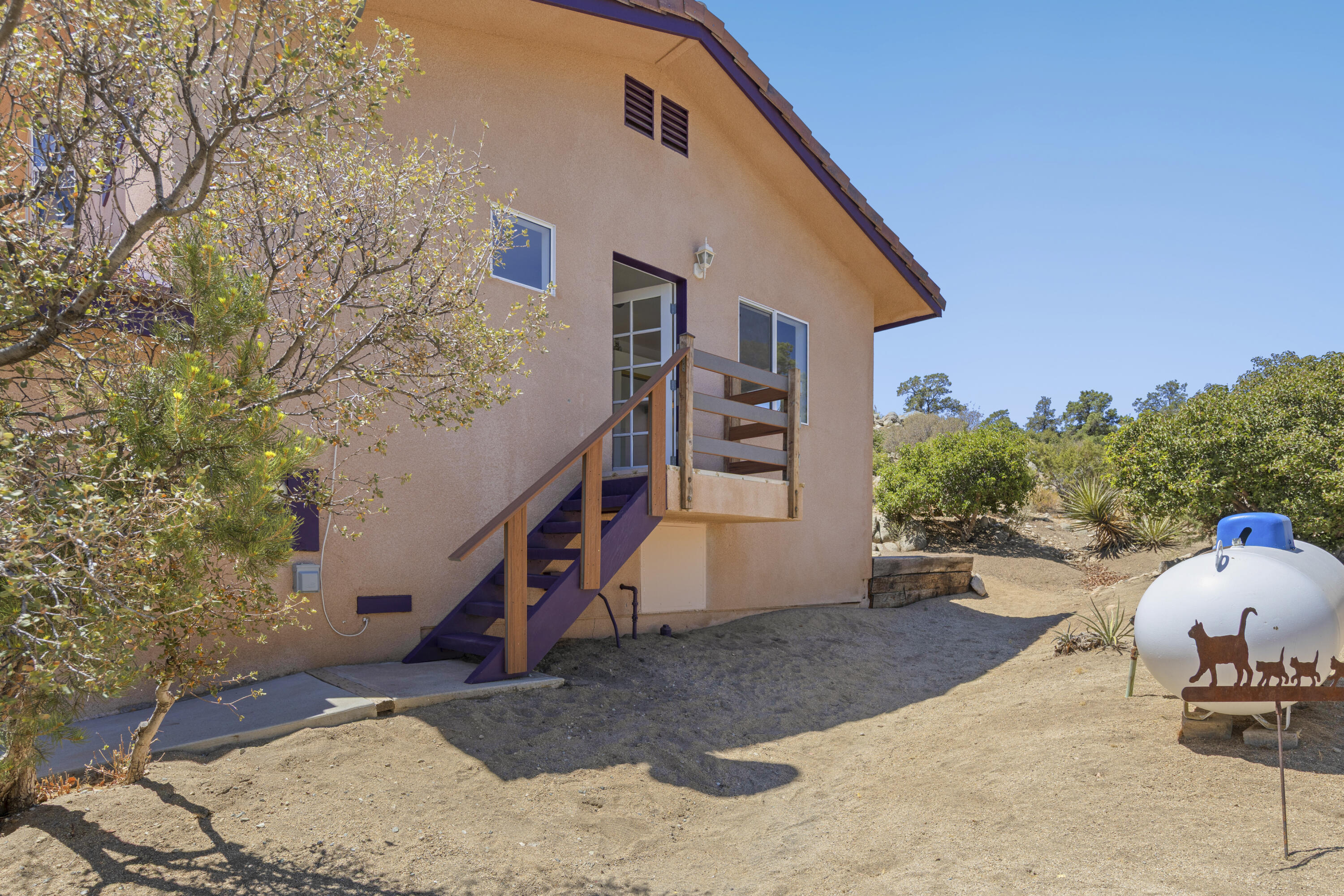 60425 Santa Rosa Road Mountain Center, CA 92561 - Photo 65 of 67 a backyard of a house with table and chairs