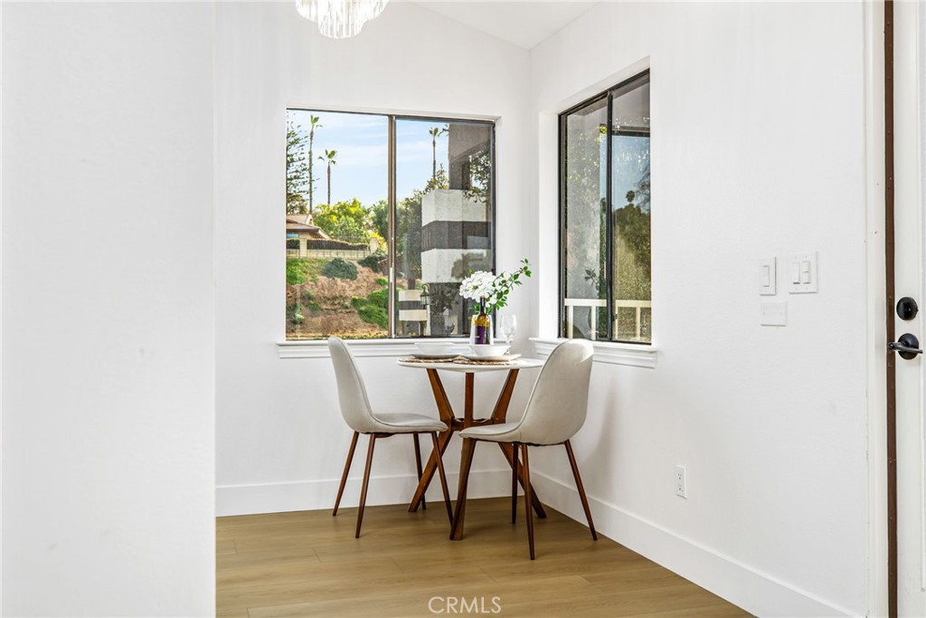 16066 Rancho Verde Circle Riverside, CA 92506 - Photo 16 of 51 a view of a dining room with furniture window and outside view