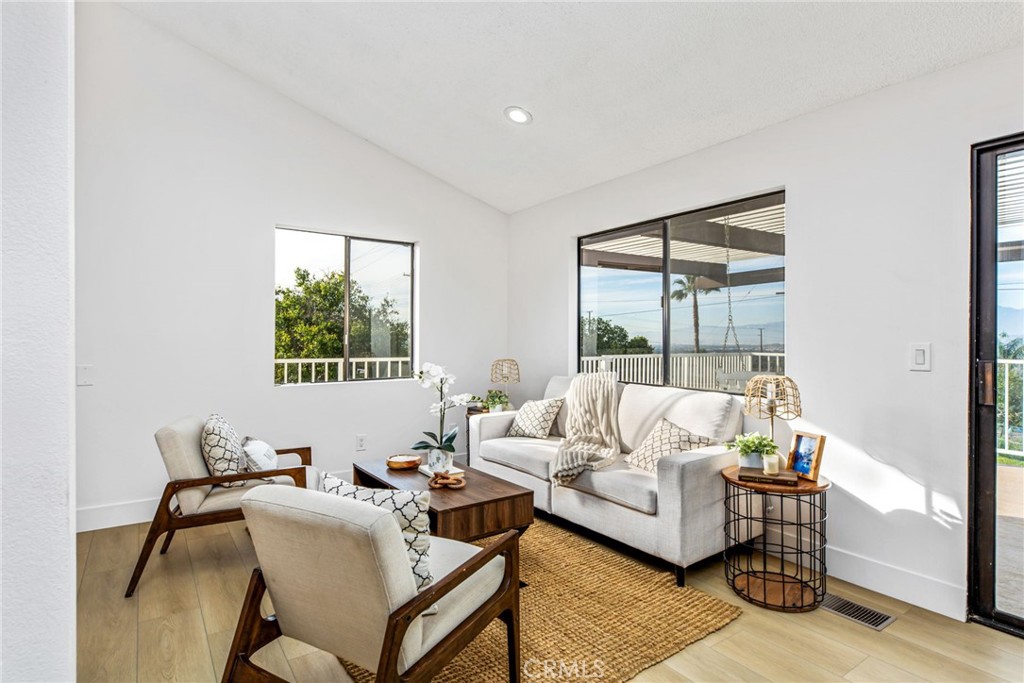 16066 Rancho Verde Circle Riverside, CA 92506 - Photo 17 of 51 a living room with furniture and a window