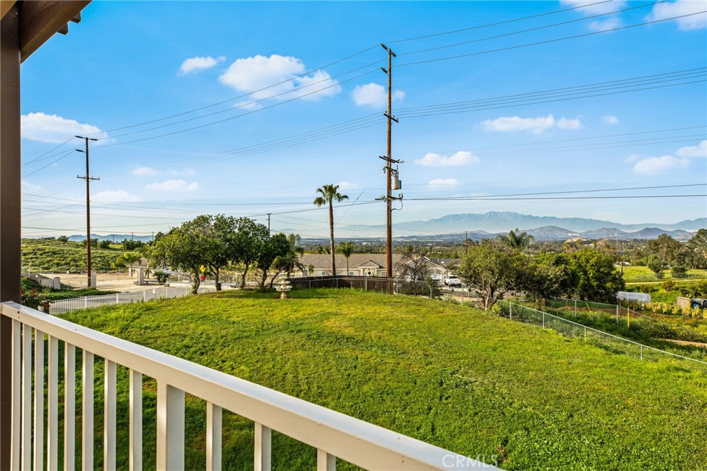 16066 Rancho Verde Circle Riverside, CA 92506 - Photo 31 of 51 a view of a balcony with a swimming pool