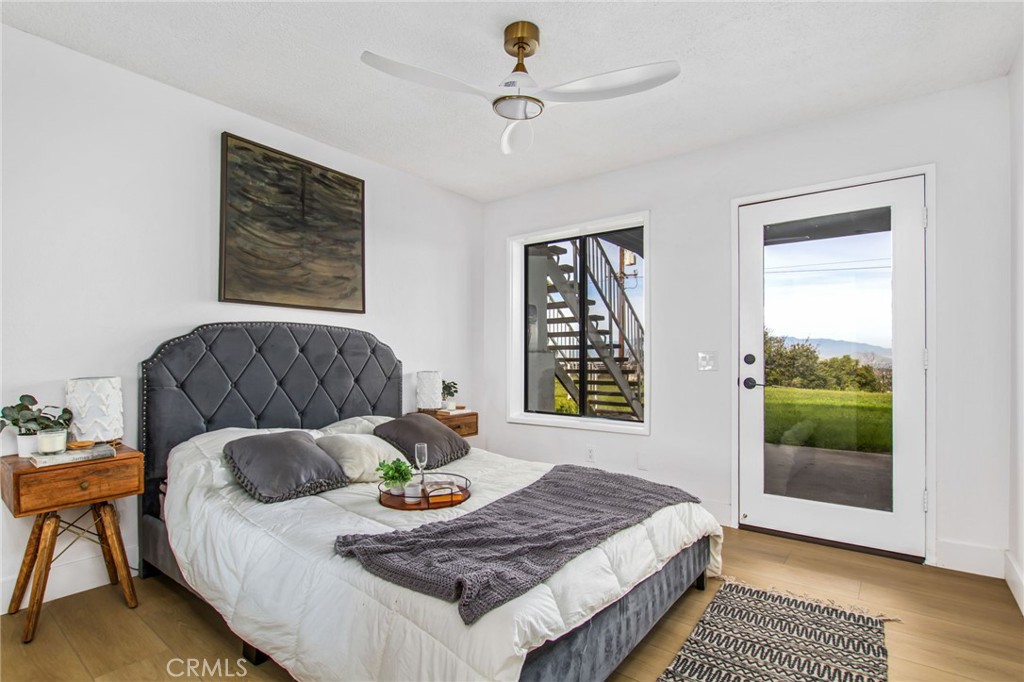 16066 Rancho Verde Circle Riverside, CA 92506 - Photo 40 of 51 a living room with furniture and a window