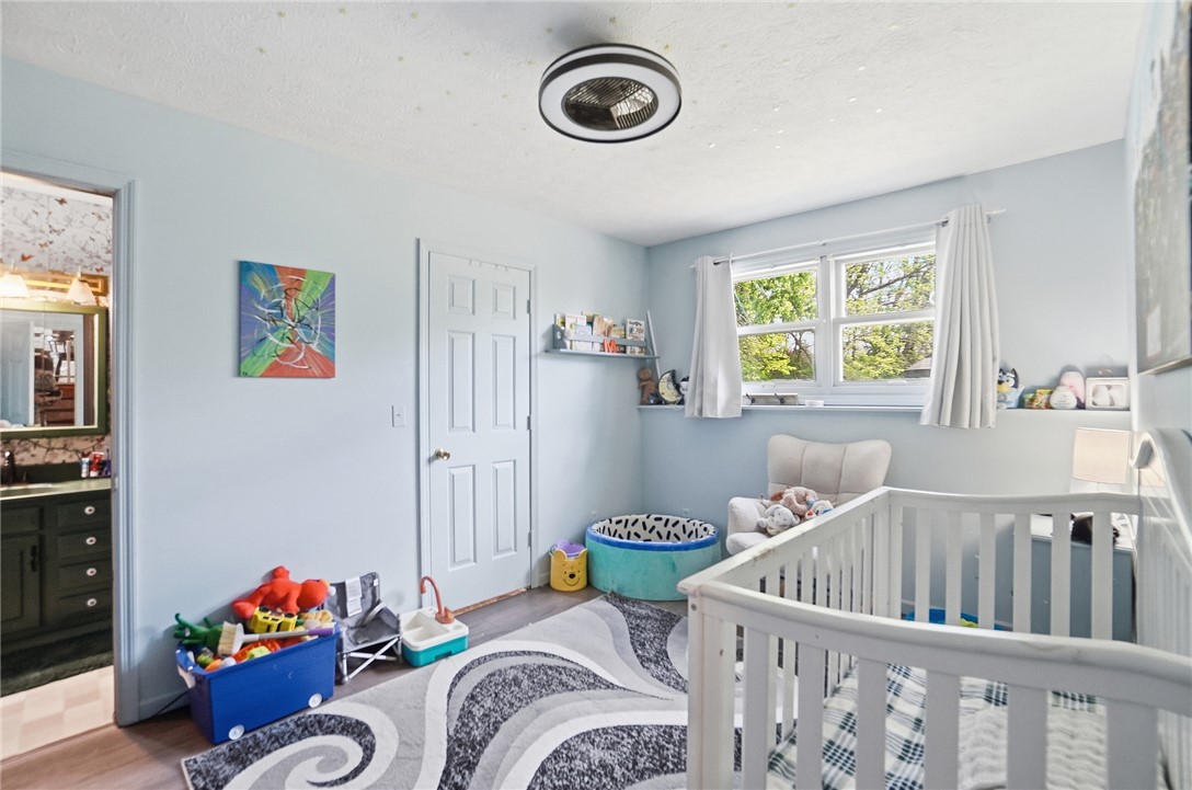 5209 North Addison New Carlisle Road St. Paris, OH 43072 - Photo 35 of 47 This bright and inviting room offers a comfortable and serene atmosphere.
