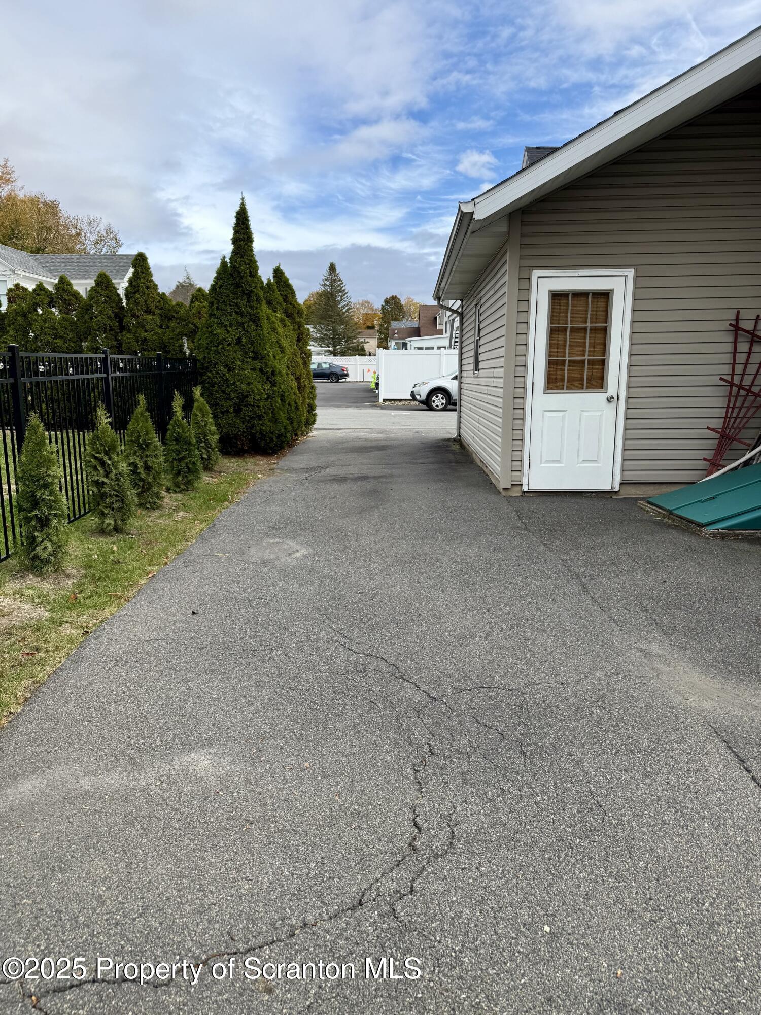 302 Main Street Blakely, PA 18452 - Photo 12 of 38 a view of a back yard of the house
