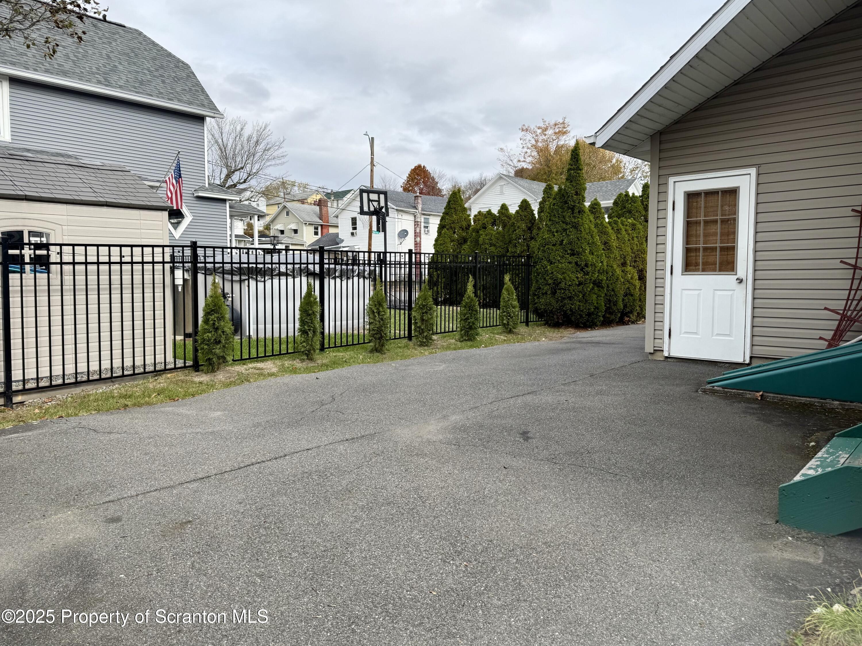 302 Main Street Blakely, PA 18452 - Photo 13 of 38 a view of a house with a street