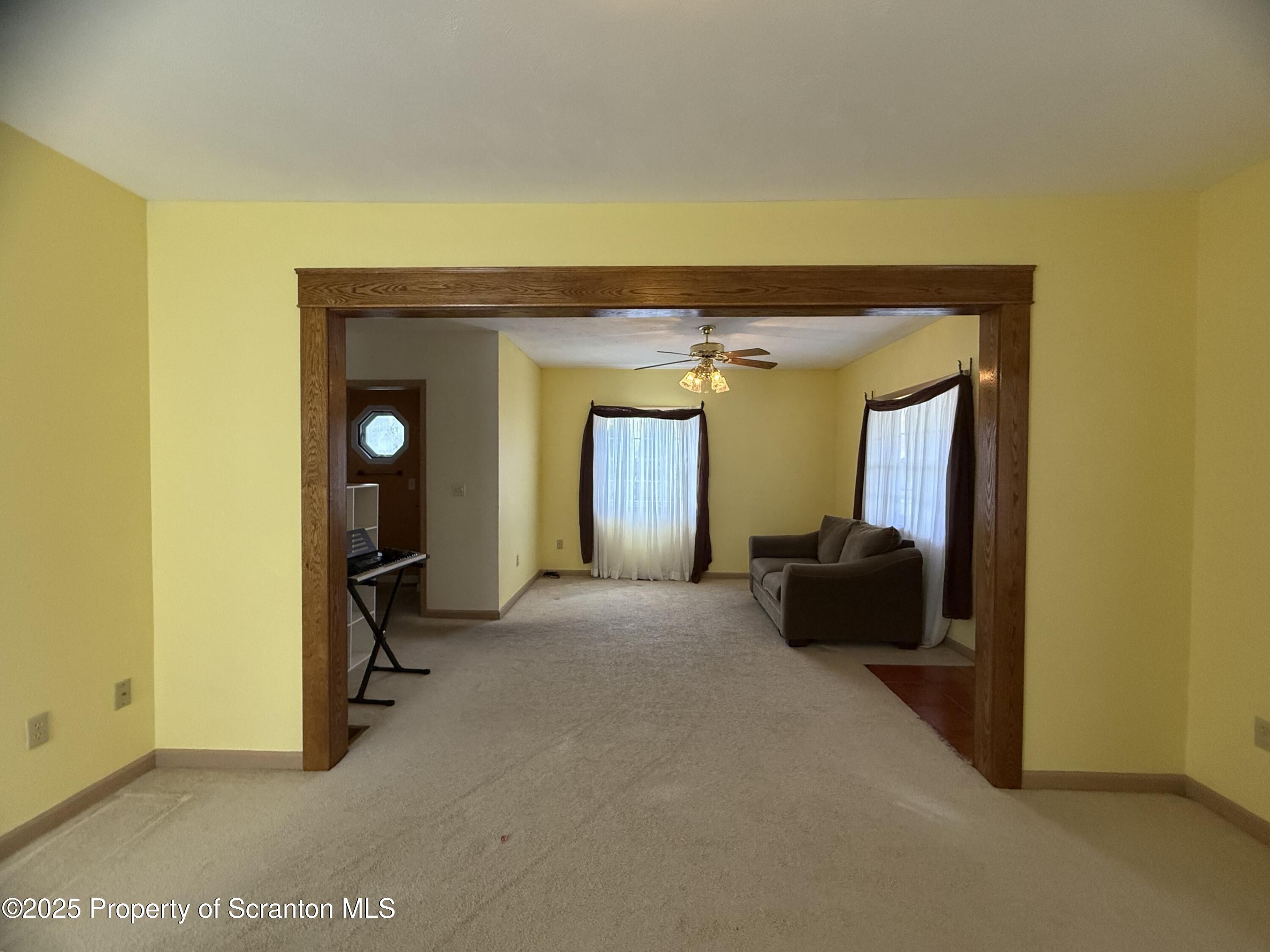 302 Main Street Blakely, PA 18452 - Photo 21 of 38 a view of a livingroom with a staircase
