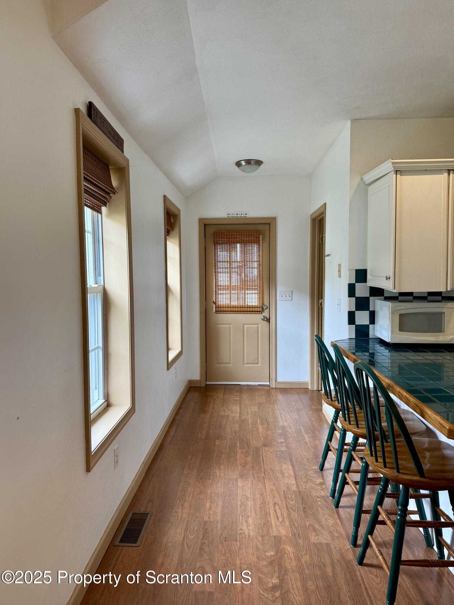 302 Main Street Blakely, PA 18452 - Photo 26 of 38 a view of a room with furniture and wooden floor