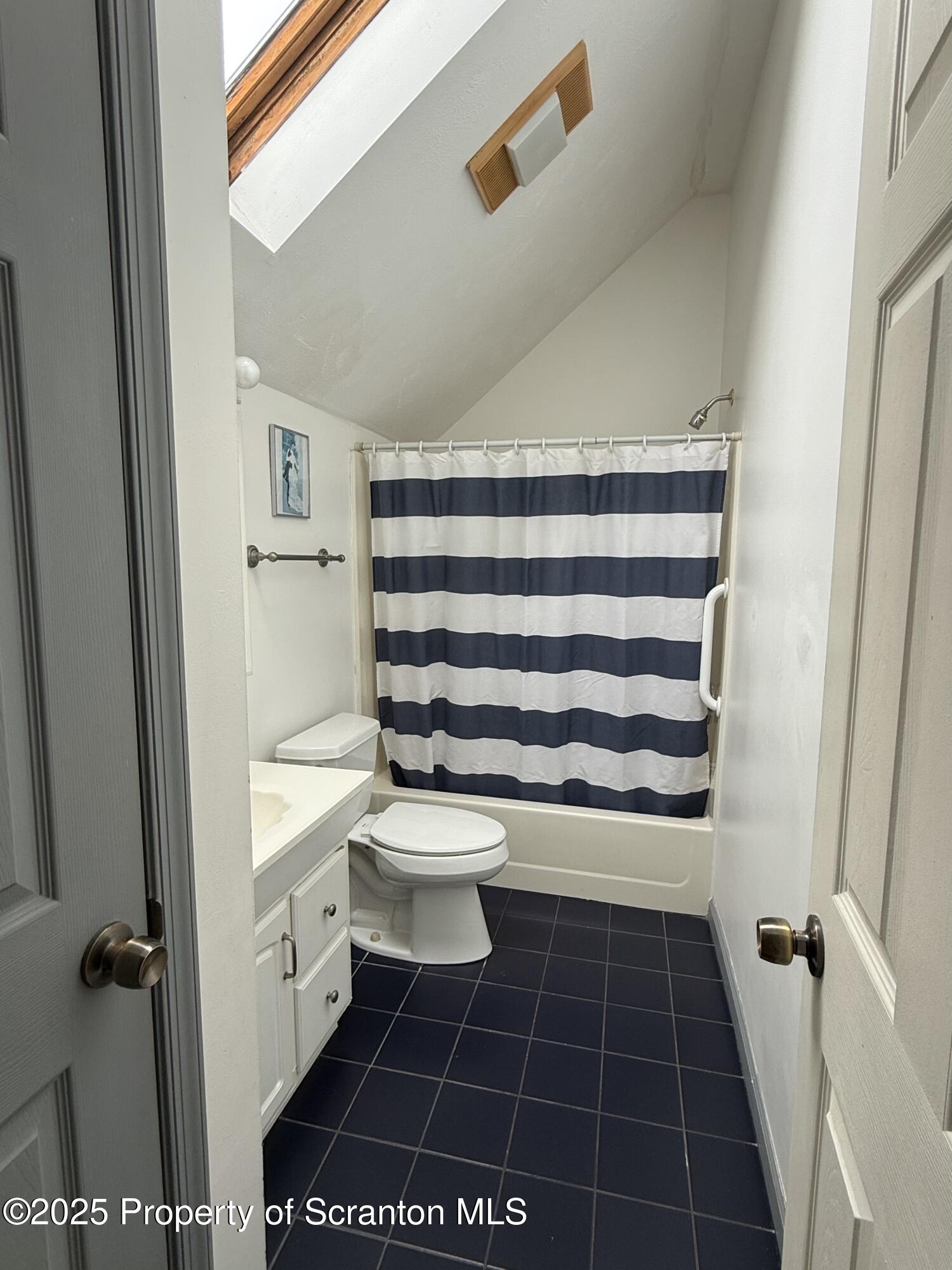 302 Main Street Blakely, PA 18452 - Photo 30 of 38 a bathroom with a toilet and a shower