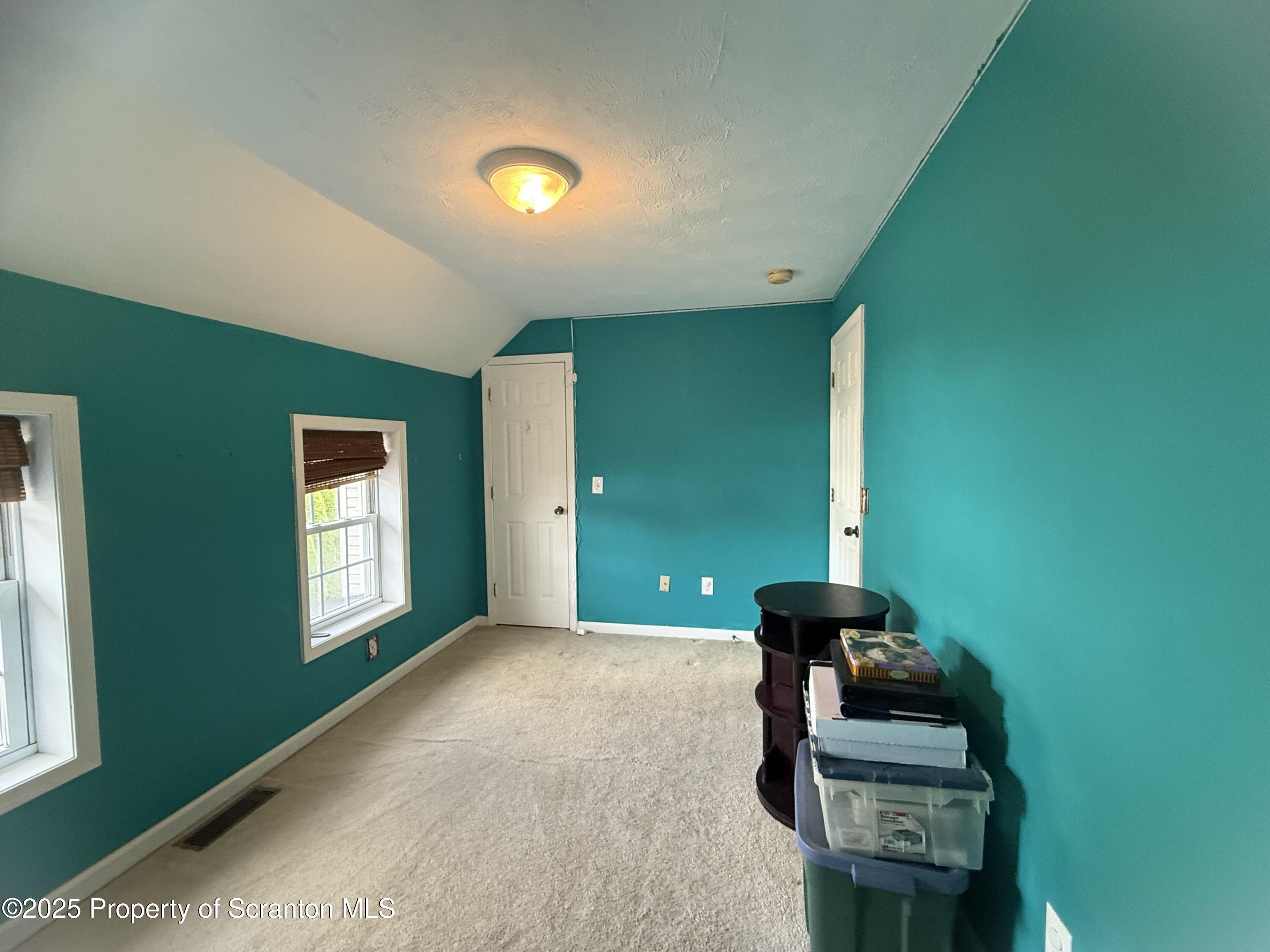 302 Main Street Blakely, PA 18452 - Photo 35 of 38 a view of livingroom with furniture and windows